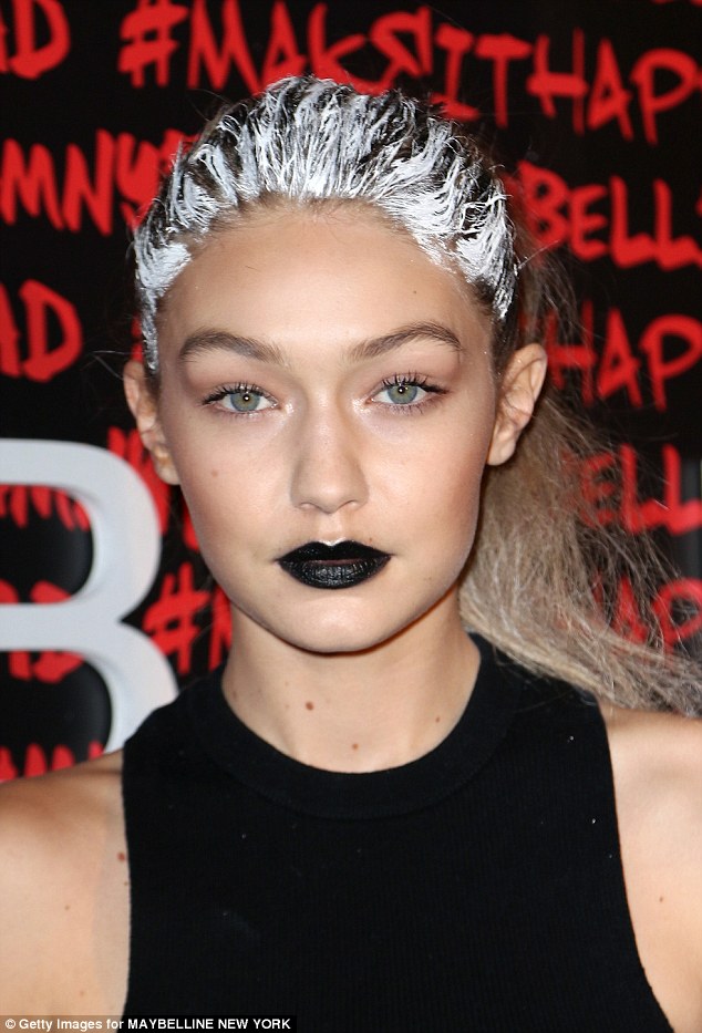 White hot! Sporting a layer of white on her honey coloured locks, the 20-year-old rocked the unusual hairstyle after dying her tresses to walk in Rihanna